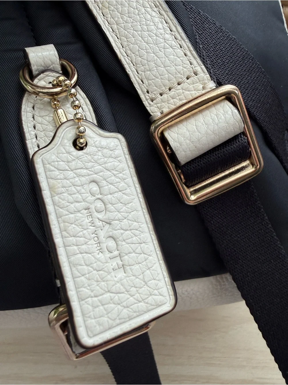 Coach Ivory Pebbled Backpack with Zipper Accent and Zip Closure